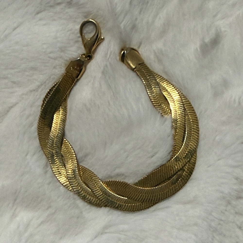 Avon Gold-tone Triple Strand Braided Herringbone Chain Bracelet 7 2/2 inches.